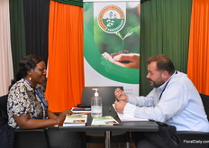 Gentrix Juma (left) from KEPHIS has an interesting conversation with Umut Bayram from Every Acre Kenya.